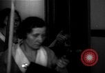 Standbild lange Schlange von uniformierten Zimmermädchen erhalten ihre Reinigungsgeräte United States USA, 1945, aus Sekunde 57 historischem Filmmaterial Videoclip 65675046827