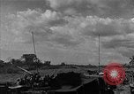 Standbild Truppen eingeben Carigara Philippinen, 1945, aus Sekunde 39 historischem Filmmaterial Videoclip 65675046852