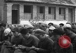 Immagine di Gli uomini lo studio Provincia di Shaanxi Cina, 1939, secondo 34 filmato di repertorio 65675046861