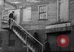 Standbild Docks Gloucester Massachusetts USA, 1935, aus Sekunde 13 historischem Filmmaterial Videoclip 65675046877
