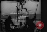 Image of Unloading fish Boston Massachusetts USA, 1935, second 34 stock footage video 65675046895