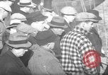 Image of sullen crowd views Canadian fishing boat Boston Massachusetts USA, 1935, second 1 stock footage video 65675046899