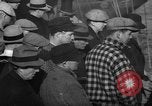 Image of sullen crowd views Canadian fishing boat Boston Massachusetts USA, 1935, second 3 stock footage video 65675046899
