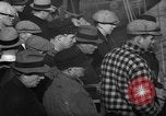 Image of sullen crowd views Canadian fishing boat Boston Massachusetts USA, 1935, second 4 stock footage video 65675046899