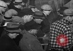 Image of sullen crowd views Canadian fishing boat Boston Massachusetts USA, 1935, second 5 stock footage video 65675046899