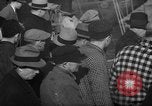 Image of sullen crowd views Canadian fishing boat Boston Massachusetts USA, 1935, second 19 stock footage video 65675046899