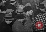 Image of sullen crowd views Canadian fishing boat Boston Massachusetts USA, 1935, second 20 stock footage video 65675046899
