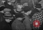 Image of sullen crowd views Canadian fishing boat Boston Massachusetts USA, 1935, second 21 stock footage video 65675046899
