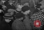Image of sullen crowd views Canadian fishing boat Boston Massachusetts USA, 1935, second 22 stock footage video 65675046899
