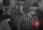 Image of sullen crowd views Canadian fishing boat Boston Massachusetts USA, 1935, second 29 stock footage video 65675046899