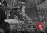 Image of sullen crowd views Canadian fishing boat Boston Massachusetts USA, 1935, second 32 stock footage video 65675046899