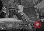 Image of sullen crowd views Canadian fishing boat Boston Massachusetts USA, 1935, second 33 stock footage video 65675046899