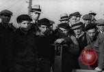 Image of sullen crowd views Canadian fishing boat Boston Massachusetts USA, 1935, second 61 stock footage video 65675046899