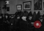 Image of Men playing cards in a club Boston Massachusetts USA, 1935, second 32 stock footage video 65675046906