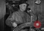 Image of Fishing boat Captain reports catch on radio Boston Massachusetts USA, 1935, second 3 stock footage video 65675046907
