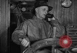Image of Fishing boat Captain reports catch on radio Boston Massachusetts USA, 1935, second 28 stock footage video 65675046907