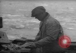 Image of fish cut to use as bait Boston Massachusetts USA, 1935, second 25 stock footage video 65675046911