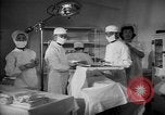 Immagine di Internamento giapponese del team di chirurgia Santa Anita California USA, 1942, secondo 8 filmato di repertorio 65675046929
