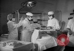 Immagine di Internamento giapponese del team di chirurgia Santa Anita California USA, 1942, secondo 9 filmato di repertorio 65675046929