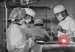 Immagine di Internamento giapponese del team di chirurgia Santa Anita California USA, 1942, secondo 54 filmato di repertorio 65675046929