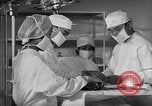 Immagine di Internamento giapponese del team di chirurgia Santa Anita California USA, 1942, secondo 55 filmato di repertorio 65675046929