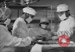 Immagine di Internamento giapponese del team di chirurgia Santa Anita California USA, 1942, secondo 56 filmato di repertorio 65675046929