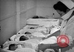 Immagine di Internamento giapponese centro vivaio per neonati Santa Anita California USA, 1942, secondo 36 filmato di repertorio 65675046931