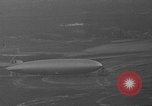 Image of Hindenburg and USS Los Angeles Zeppelins Lakehurst Naval Air Station New Jersey USA, 1936, second 4 stock footage video 65675047064