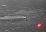 Image of Hindenburg and USS Los Angeles Zeppelins Lakehurst Naval Air Station New Jersey USA, 1936, second 9 stock footage video 65675047064