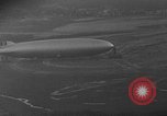 Image of Hindenburg and USS Los Angeles Zeppelins Lakehurst Naval Air Station New Jersey USA, 1936, second 14 stock footage video 65675047064
