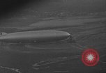 Image of Hindenburg and USS Los Angeles Zeppelins Lakehurst Naval Air Station New Jersey USA, 1936, second 15 stock footage video 65675047064