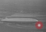Image of Hindenburg and USS Los Angeles Zeppelins Lakehurst Naval Air Station New Jersey USA, 1936, second 17 stock footage video 65675047064
