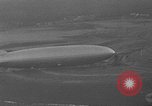 Image of Hindenburg and USS Los Angeles Zeppelins Lakehurst Naval Air Station New Jersey USA, 1936, second 22 stock footage video 65675047064