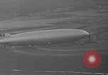 Image of Hindenburg and USS Los Angeles Zeppelins Lakehurst Naval Air Station New Jersey USA, 1936, second 23 stock footage video 65675047064