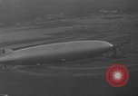 Image of Hindenburg and USS Los Angeles Zeppelins Lakehurst Naval Air Station New Jersey USA, 1936, second 27 stock footage video 65675047064