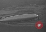 Image of Hindenburg and USS Los Angeles Zeppelins Lakehurst Naval Air Station New Jersey USA, 1936, second 29 stock footage video 65675047064
