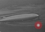 Image of Hindenburg and USS Los Angeles Zeppelins Lakehurst Naval Air Station New Jersey USA, 1936, second 30 stock footage video 65675047064