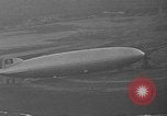 Image of Hindenburg and USS Los Angeles Zeppelins Lakehurst Naval Air Station New Jersey USA, 1936, second 31 stock footage video 65675047064