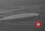 Image of Hindenburg and USS Los Angeles Zeppelins Lakehurst Naval Air Station New Jersey USA, 1936, second 32 stock footage video 65675047064