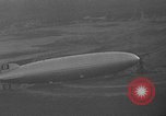 Image of Hindenburg and USS Los Angeles Zeppelins Lakehurst Naval Air Station New Jersey USA, 1936, second 33 stock footage video 65675047064