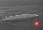 Image of Hindenburg and USS Los Angeles Zeppelins Lakehurst Naval Air Station New Jersey USA, 1936, second 40 stock footage video 65675047064