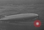 Image of Hindenburg and USS Los Angeles Zeppelins Lakehurst Naval Air Station New Jersey USA, 1936, second 42 stock footage video 65675047064
