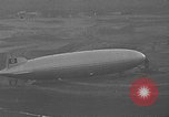 Image of Hindenburg and USS Los Angeles Zeppelins Lakehurst Naval Air Station New Jersey USA, 1936, second 43 stock footage video 65675047064