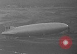 Image of Hindenburg and USS Los Angeles Zeppelins Lakehurst Naval Air Station New Jersey USA, 1936, second 44 stock footage video 65675047064
