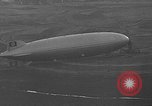 Image of Hindenburg and USS Los Angeles Zeppelins Lakehurst Naval Air Station New Jersey USA, 1936, second 46 stock footage video 65675047064
