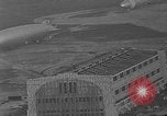 Image of Hindenburg and USS Los Angeles Zeppelins Lakehurst Naval Air Station New Jersey USA, 1936, second 52 stock footage video 65675047064