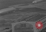 Image of Hindenburg and USS Los Angeles Zeppelins Lakehurst Naval Air Station New Jersey USA, 1936, second 53 stock footage video 65675047064