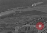 Image of Hindenburg and USS Los Angeles Zeppelins Lakehurst Naval Air Station New Jersey USA, 1936, second 54 stock footage video 65675047064