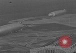 Image of Hindenburg and USS Los Angeles Zeppelins Lakehurst Naval Air Station New Jersey USA, 1936, second 55 stock footage video 65675047064
