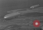 Image of Hindenburg and USS Los Angeles Zeppelins Lakehurst Naval Air Station New Jersey USA, 1936, second 59 stock footage video 65675047064